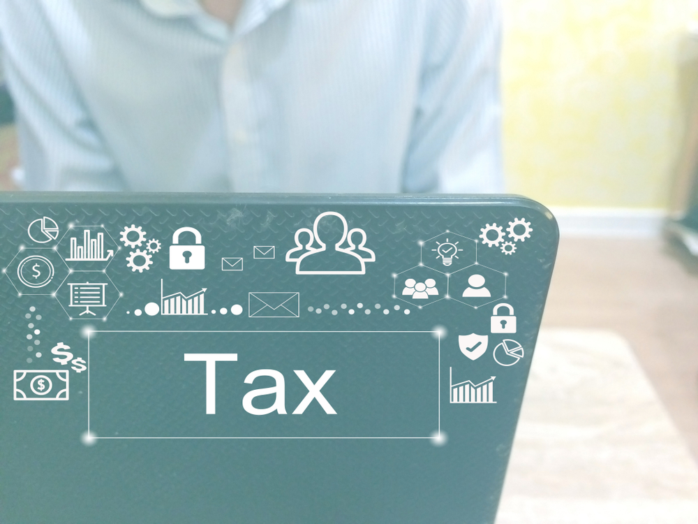 man is working on notebook and using internet-tax concept-free icon without reference